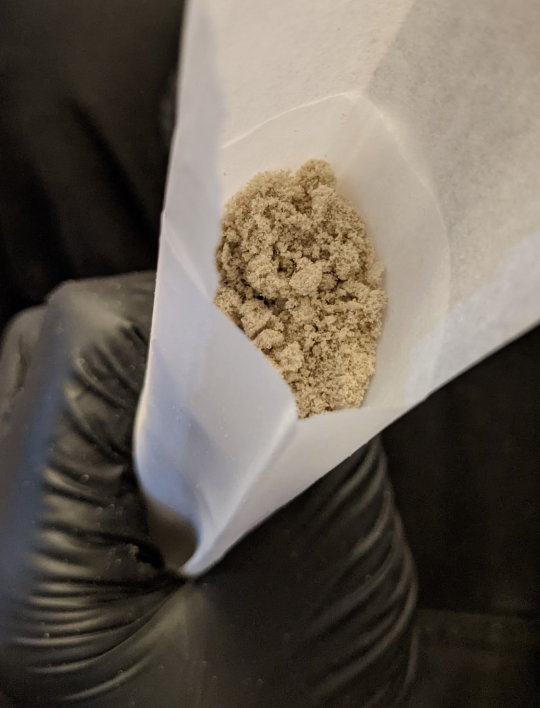 filling 25 micron bag with hash rosin